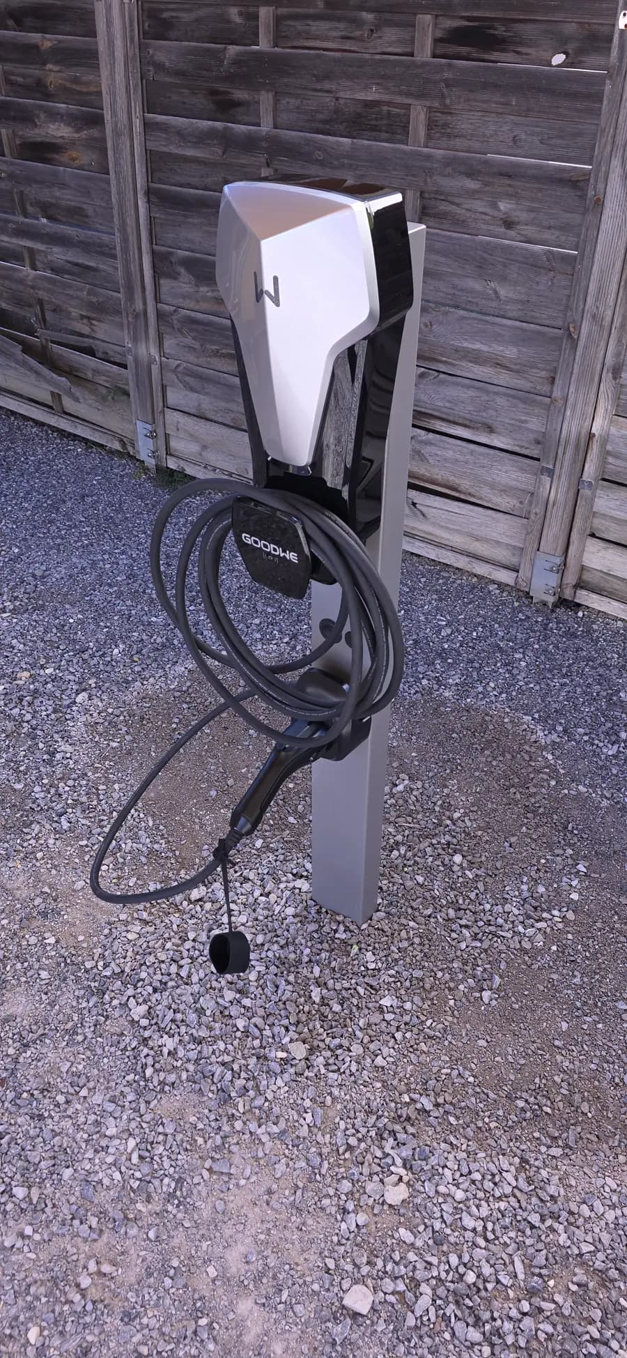 GoodWe EV charger mounted on an outdoor pedestal in Liestal, Basel-Landschaft